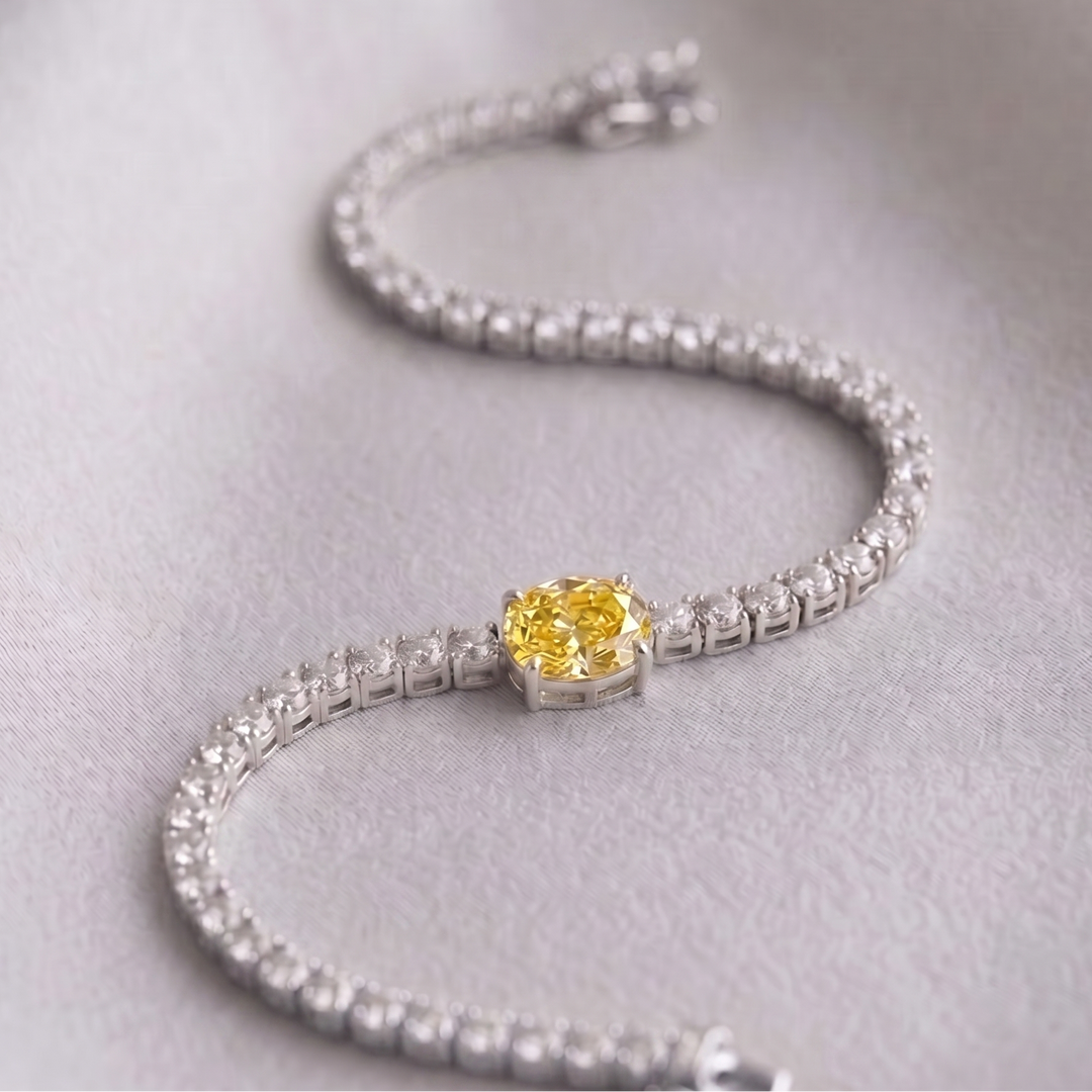 Signature Center Tennis Bracelet : Yellow Diamond Oval-Cut (MG262)