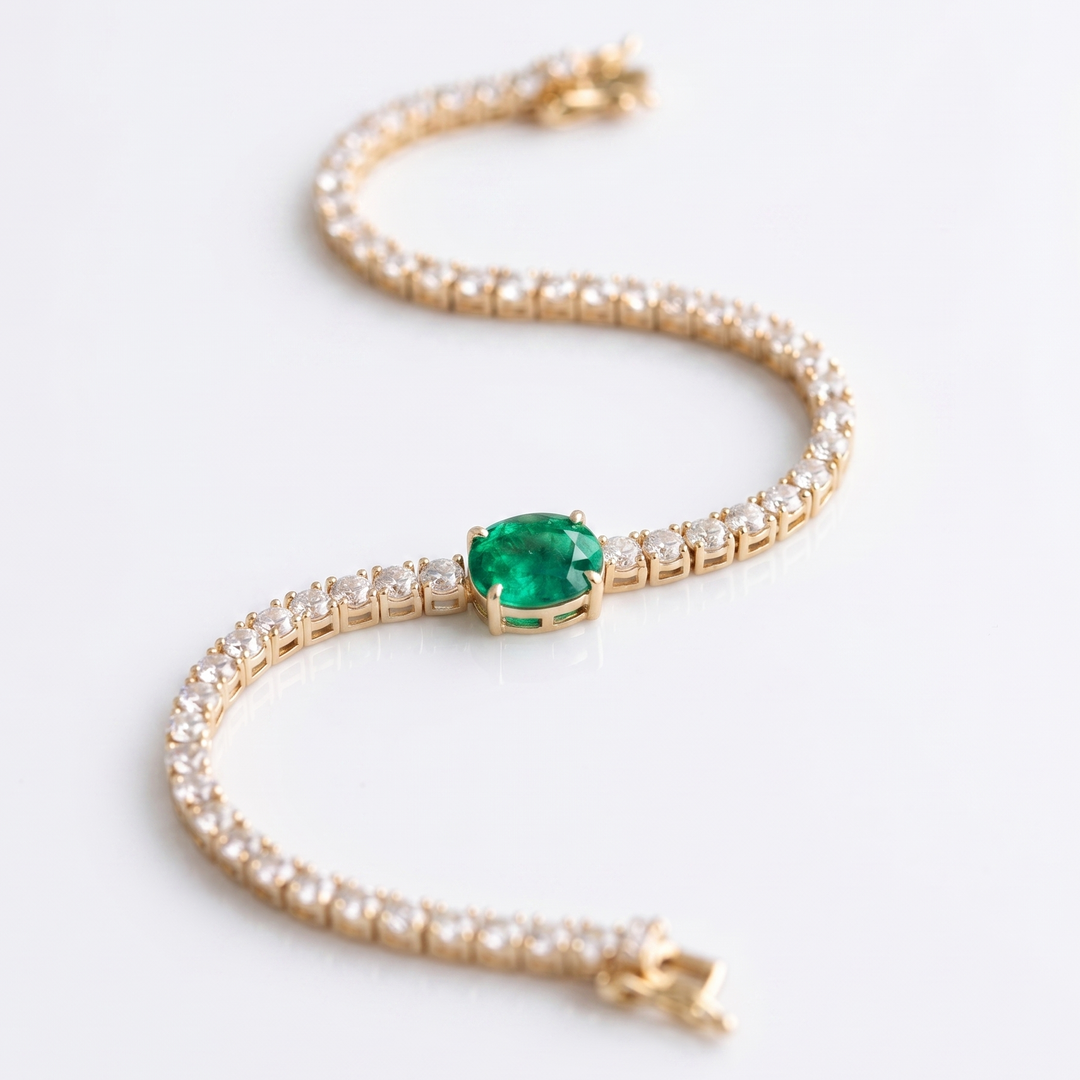 Signature Center Tennis Bracelet : Emerald Oval Cut (MG198)