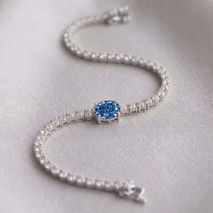Signature Center Tennis Bracelet : Blue Diamond Oval-Cut (MG266)