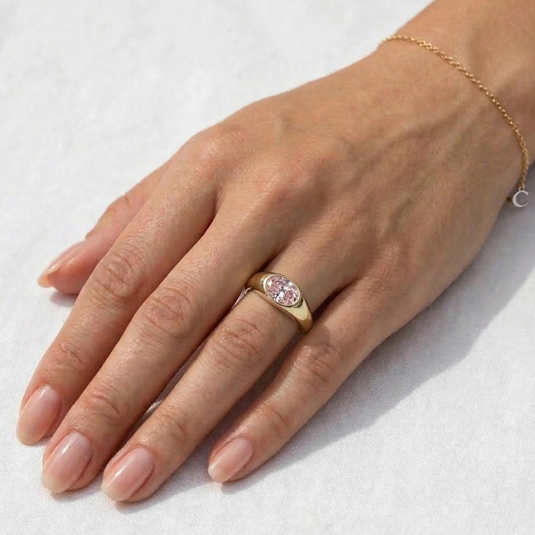 Fancy pink oval diamond ring in yellow gold — M Grace Jewelry