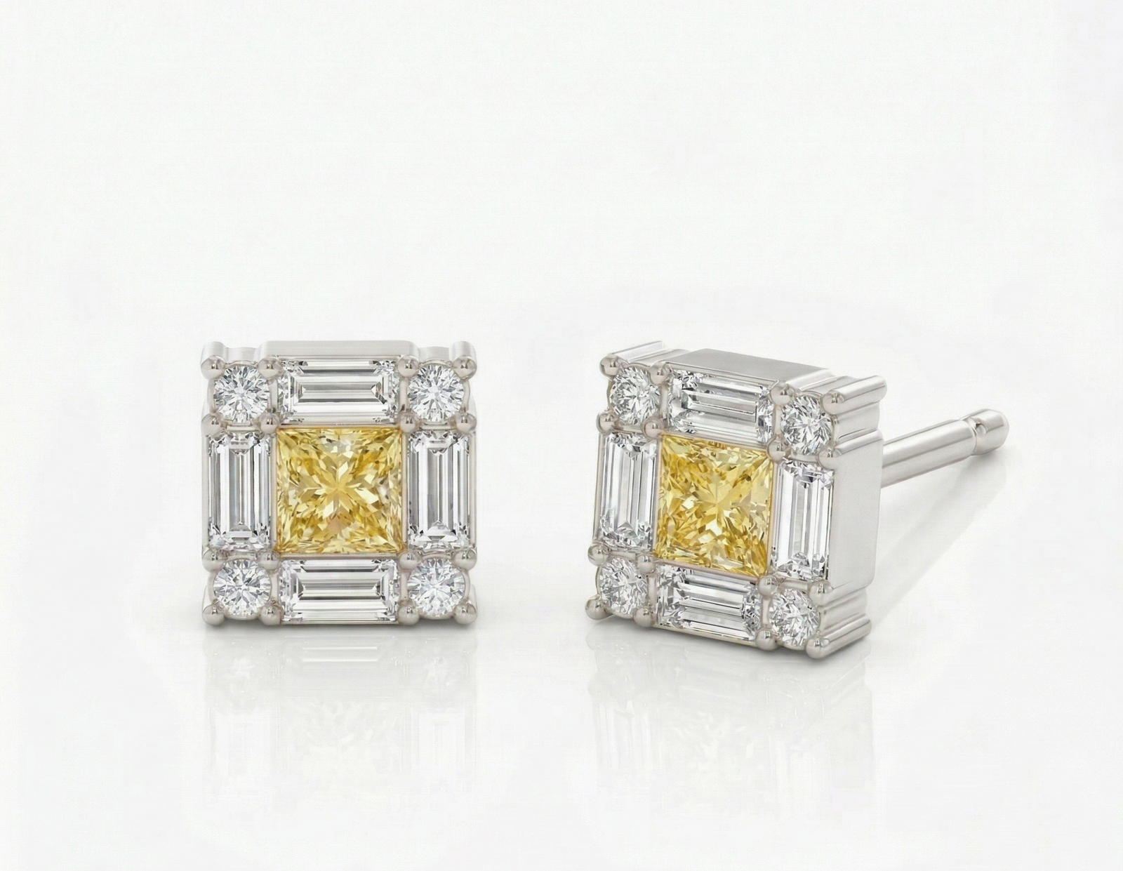 Platinum fancy yellow diamond frame stud earrings — M Grace Jewelry