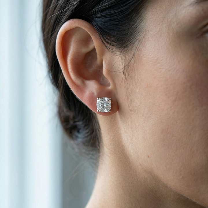 Cushion cut lab-grown diamond stud earrings in platinum, M Grace Jewelry
