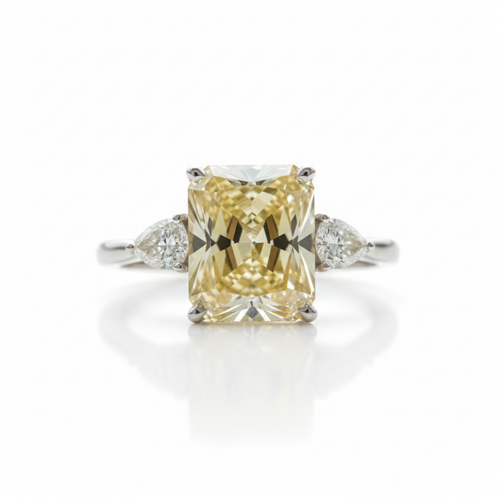 Fancy Intense Yellow radiant-cut lab diamond three-stone ring, M Grace Jewelry