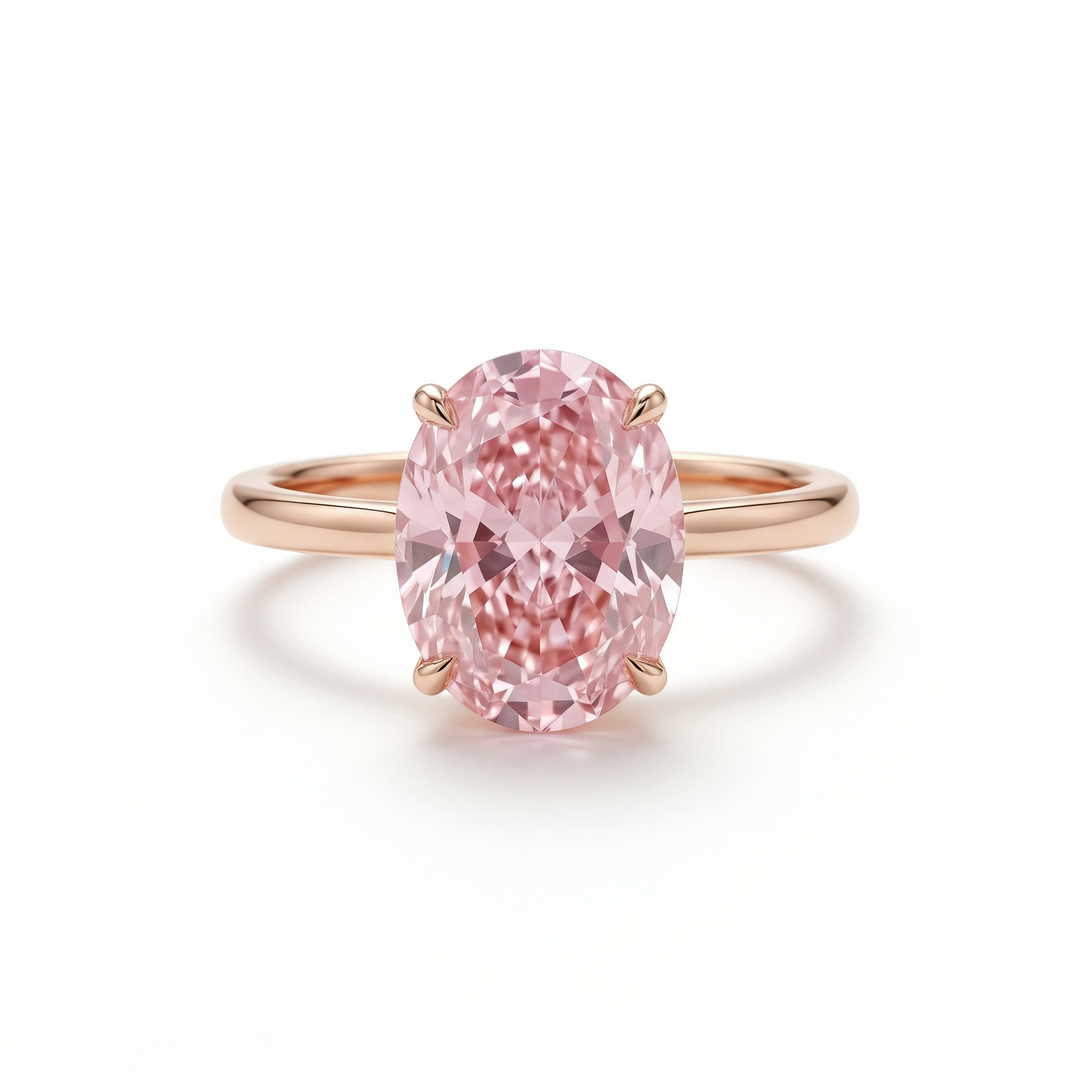 Fancy Intense Pink oval diamond solitaire ring in rose gold — M Grace Jewelry