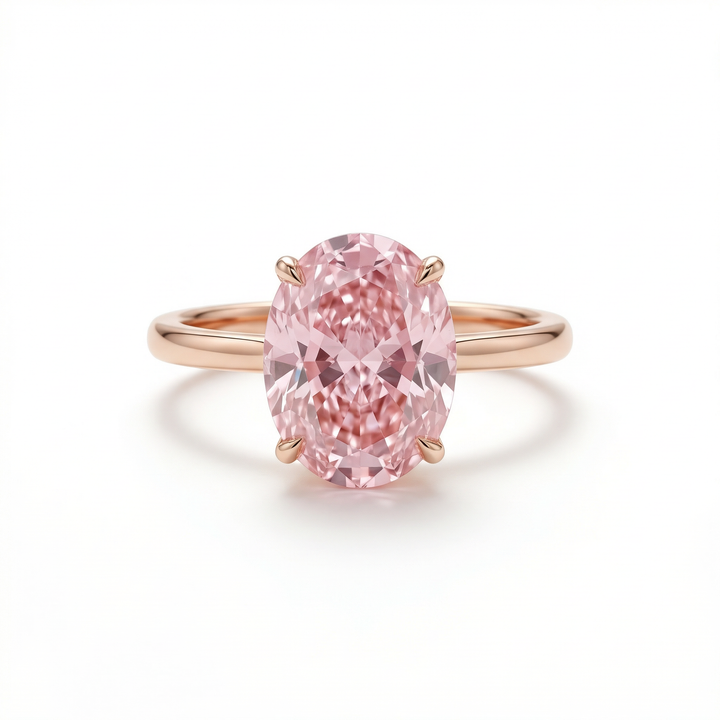 Fancy Intense Pink oval diamond solitaire ring in rose gold — M Grace Jewelry