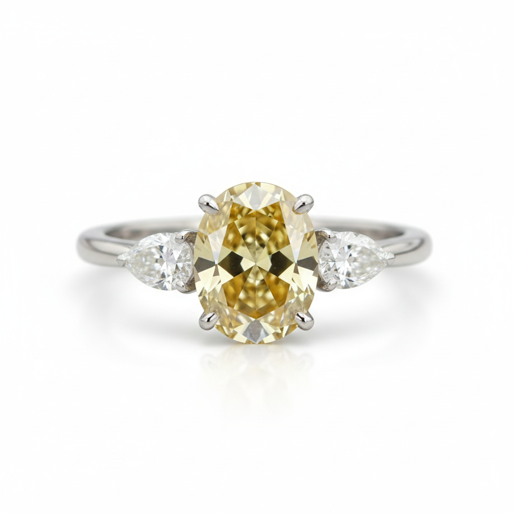 Fancy Intense Yellow oval diamond ring in platinum by M Grace Jewelry