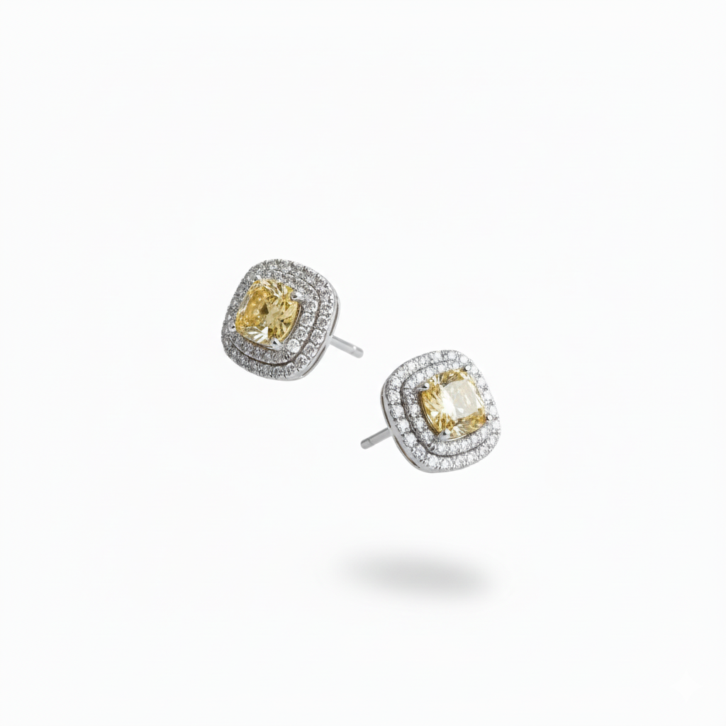 Fancy Intense Yellow cushion drop earrings in platinum, M Grace Jewelry