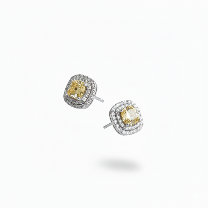 Fancy Intense Yellow cushion drop earrings in platinum, M Grace Jewelry