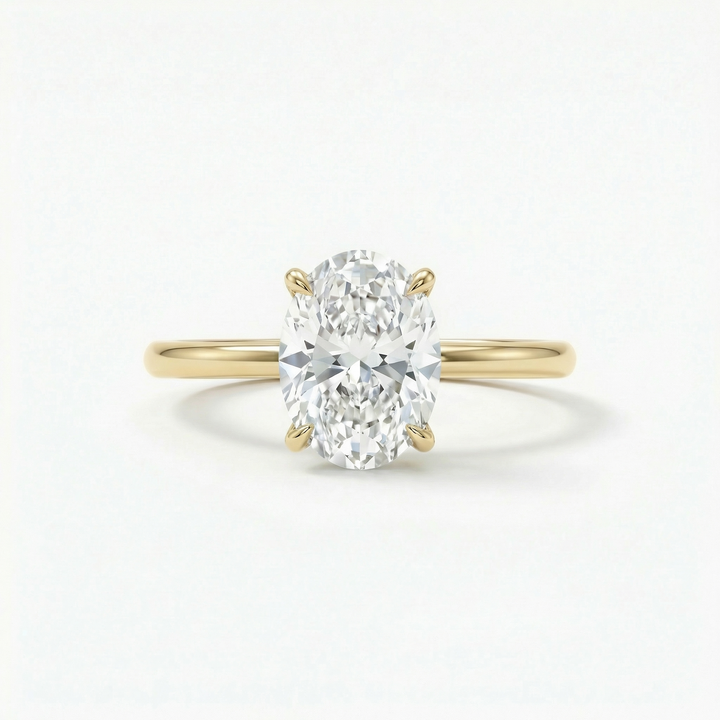 Oval lab-grown diamond solitaire ring in yellow gold — M Grace Jewelry