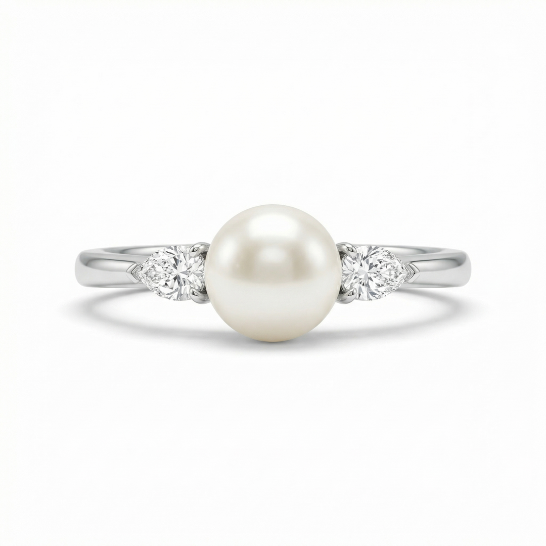 Akoya pearl and pear diamond ring in platinum — M Grace Jewelry