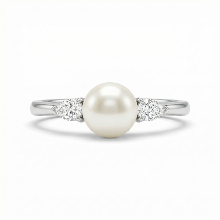 Akoya pearl and pear diamond ring in platinum — M Grace Jewelry