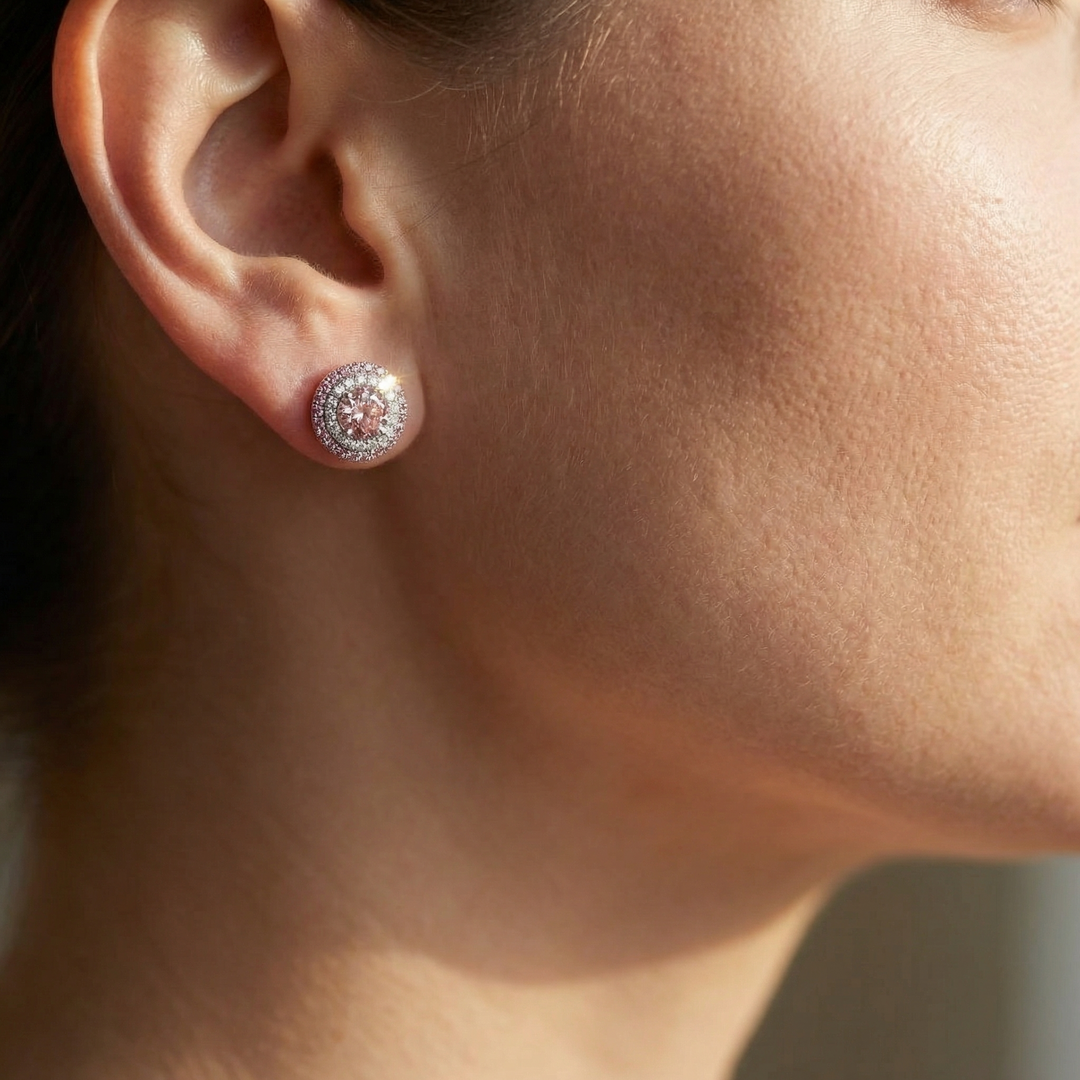 Platinum double-halo Fancy Pink diamond stud earrings by M Grace Jewelry