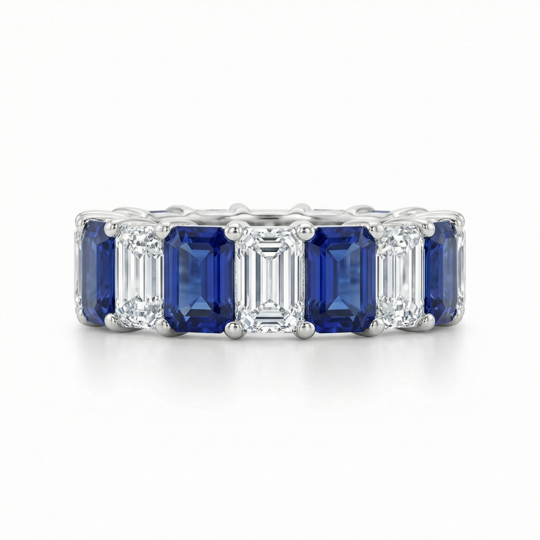 Royal blue sapphire and diamond emerald-cut eternity ring by M Grace Jewelry