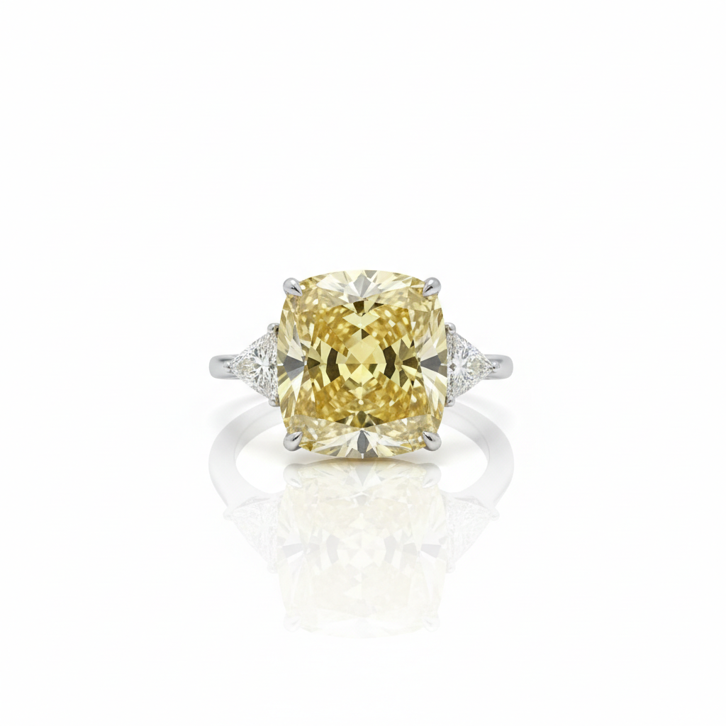 Fancy Intense Yellow cushion diamond ring with white trillion sides — M Grace Jewelry
