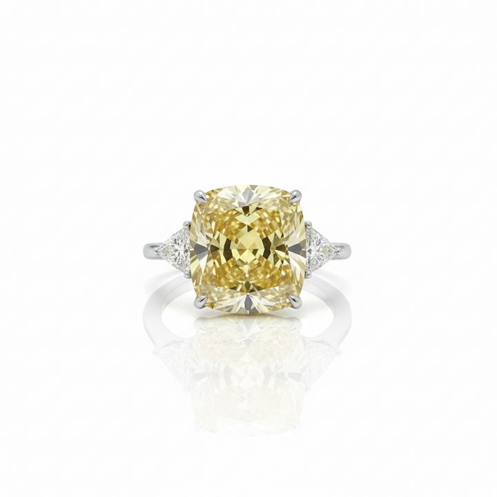 Fancy Intense Yellow cushion diamond ring with white trillion sides — M Grace Jewelry