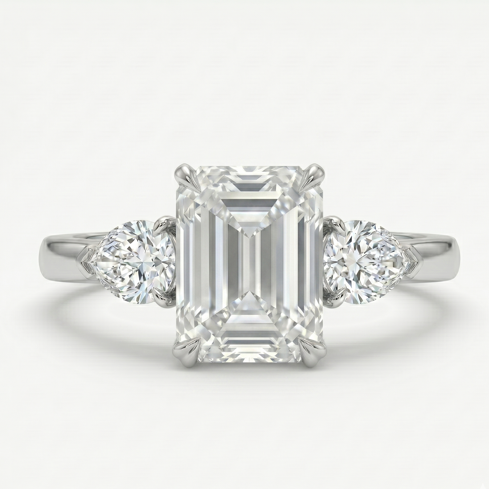 Emerald Cut Ring with Pear Cut Diamonds in Platinum | M Grace Jewelry