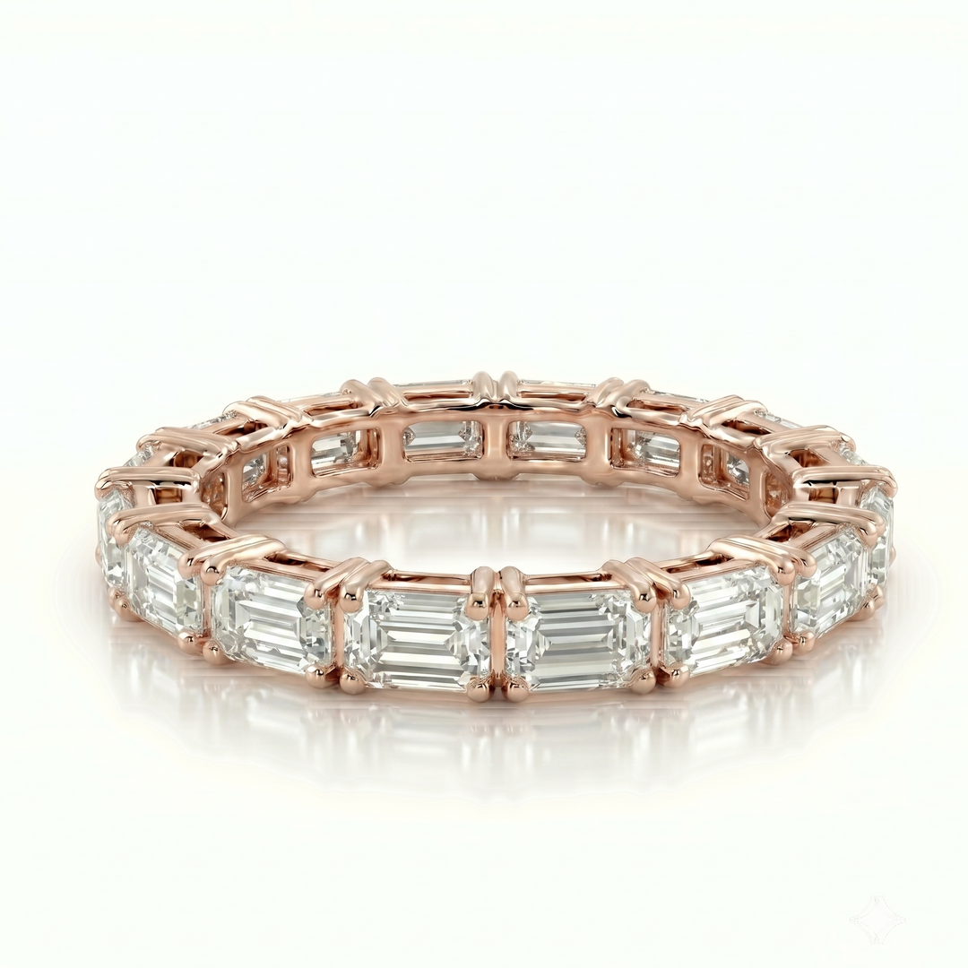 Axis Emerald Eternity Ring in 18K Pink Gold | M Grace Jewelry