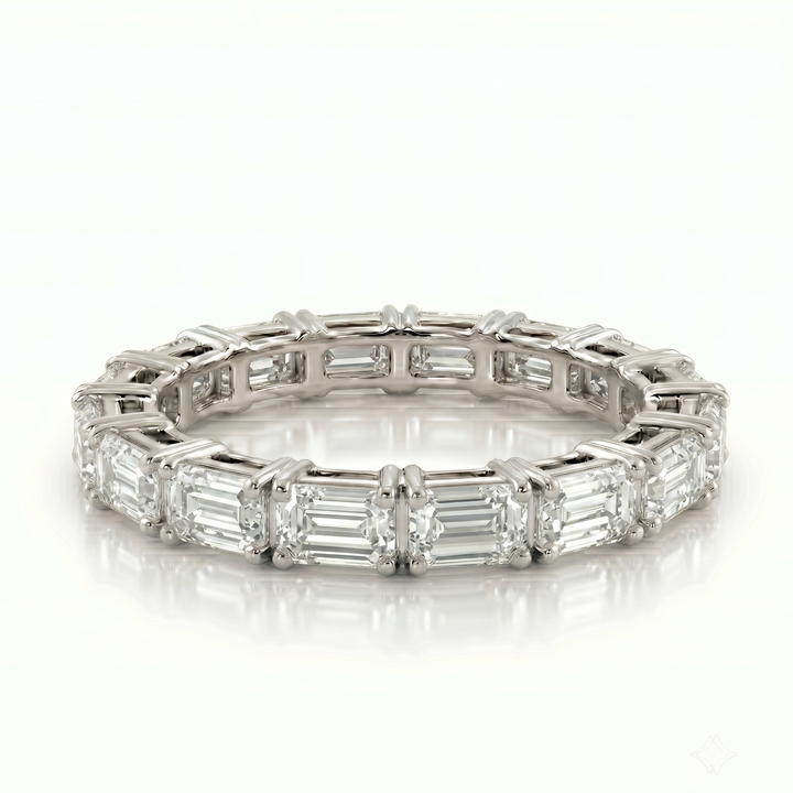 Axis Emerald Eternity Ring in Platinum | M Grace Jewelry