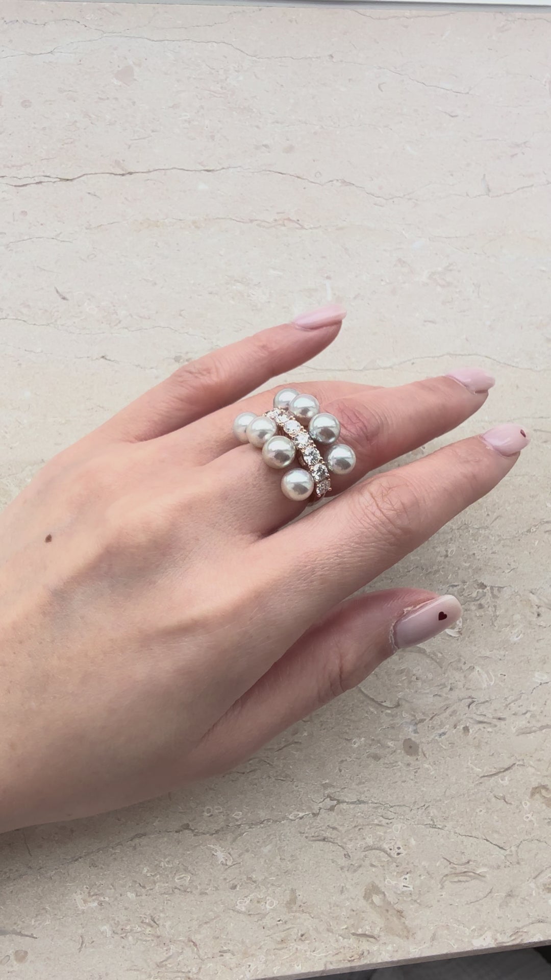 Eight Akoya pearl and diamond platinum ring by M Grace Jewelry